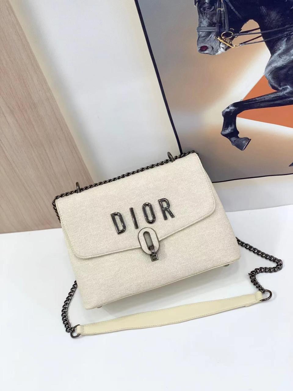 Dior Quilted Black Leather Handbag with Gold Hardware