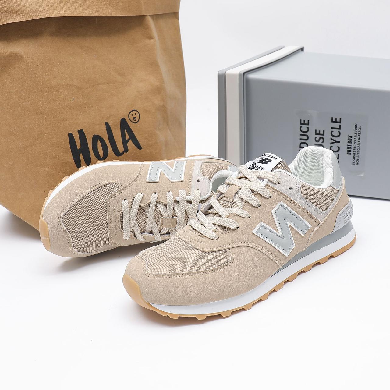 Beige sneakers with white laces and soles