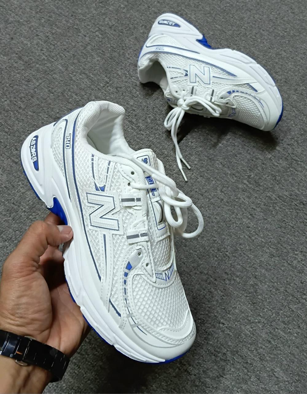 White sneakers with blue accent