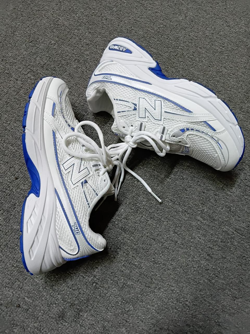White and blue running shoes