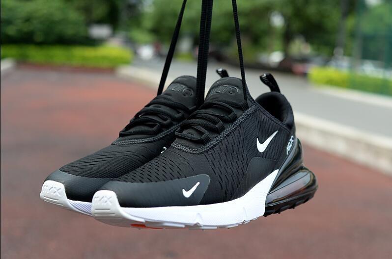 Black Nike sneakers with white sole