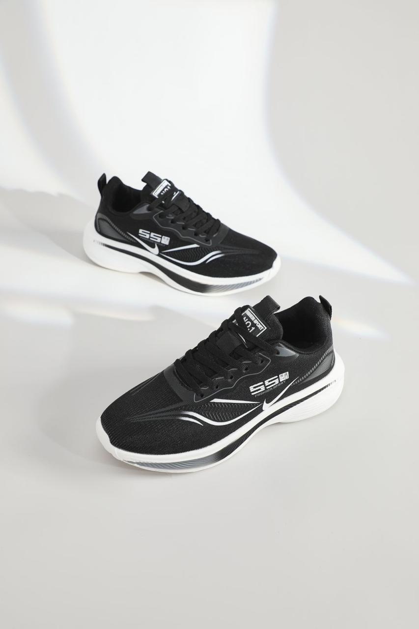 Black athletic shoes with white accents