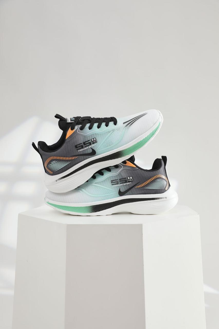 Pair of running shoes on a white pedestal
