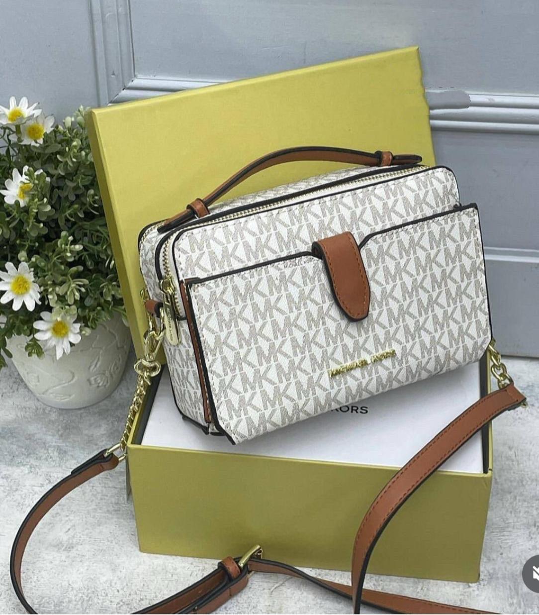 Designer handbag with brown accents