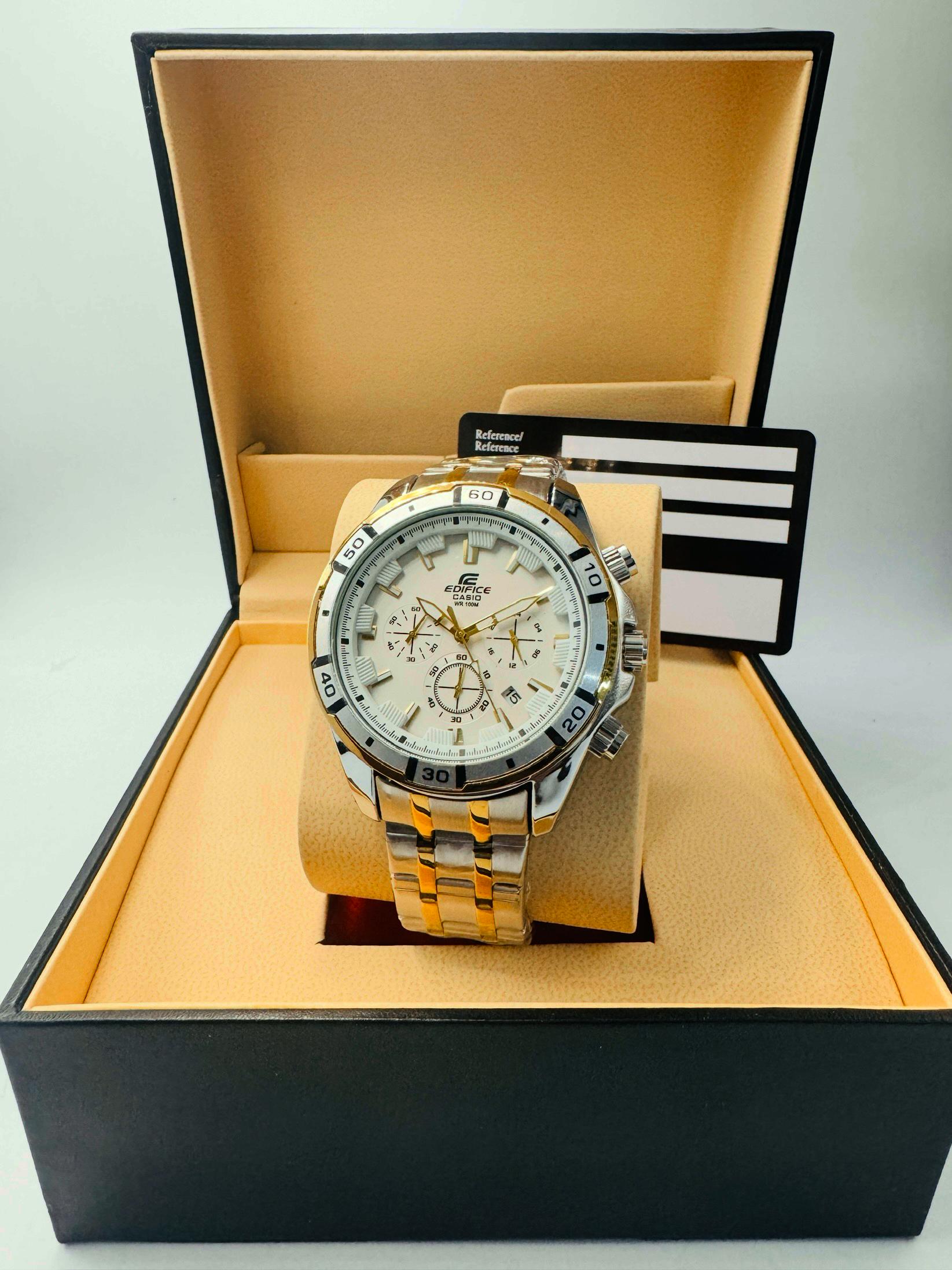 Gold and silver watch in a black
