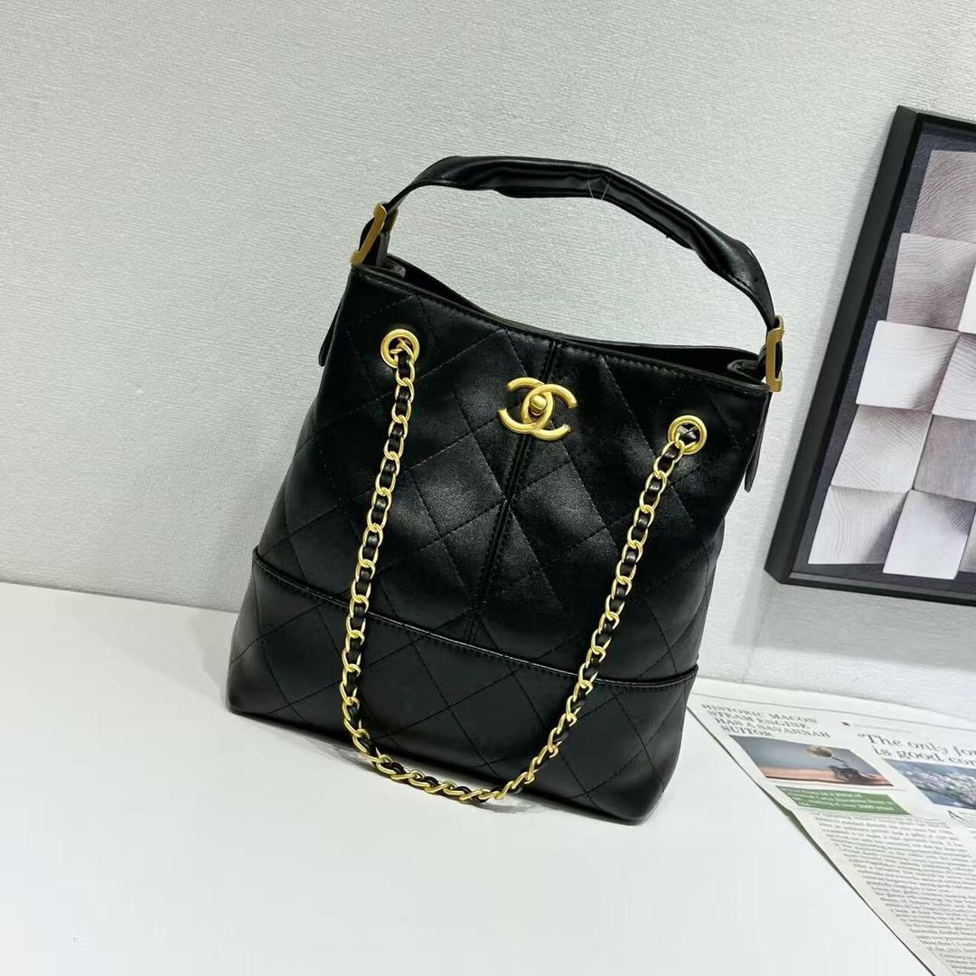Black quilted handbag