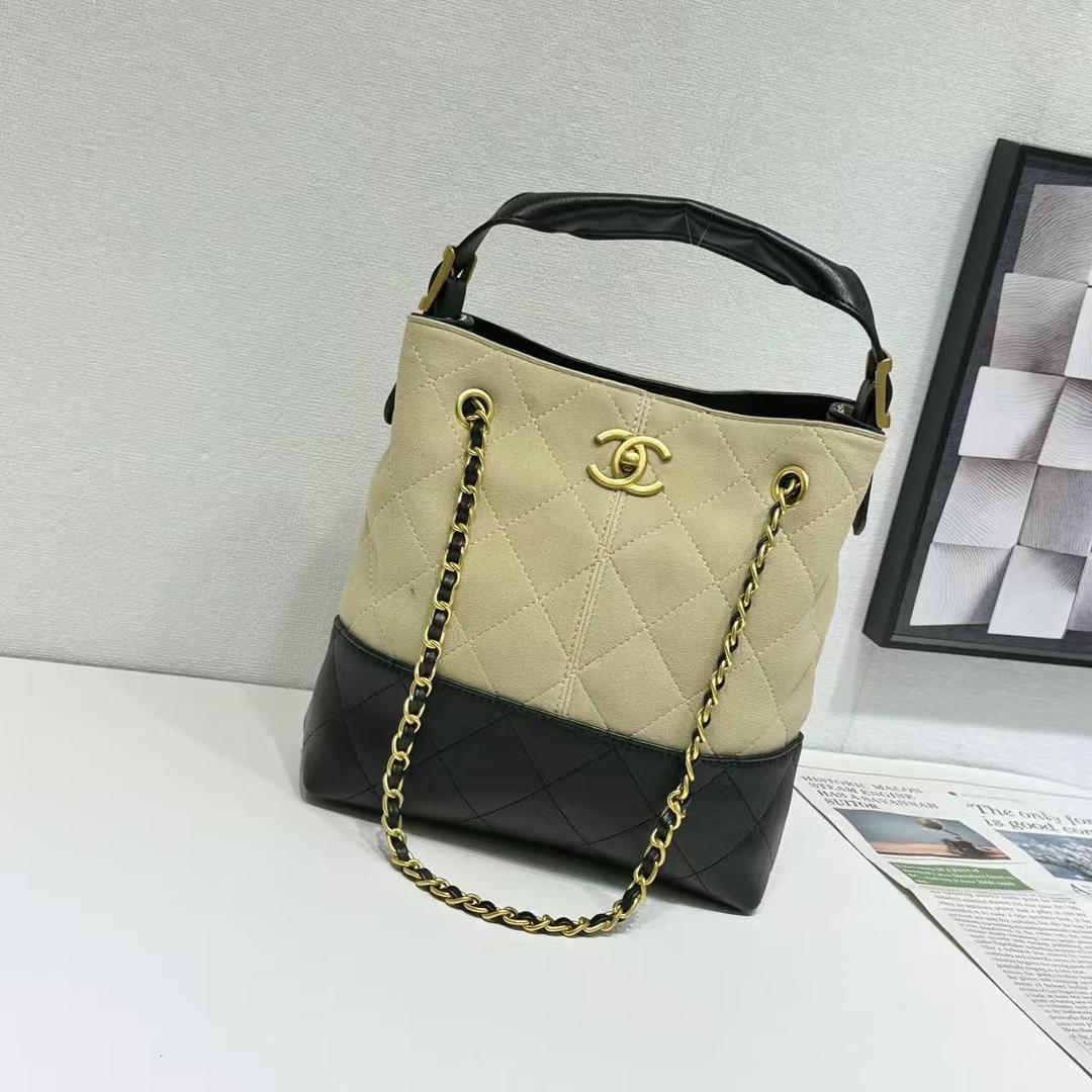 Beige and black handbag