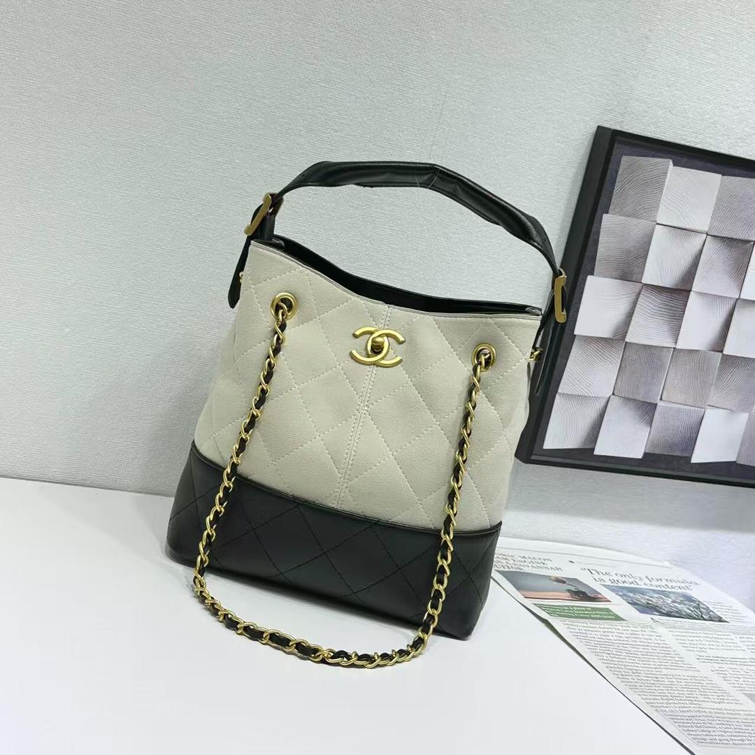 Black and white quilted handbag