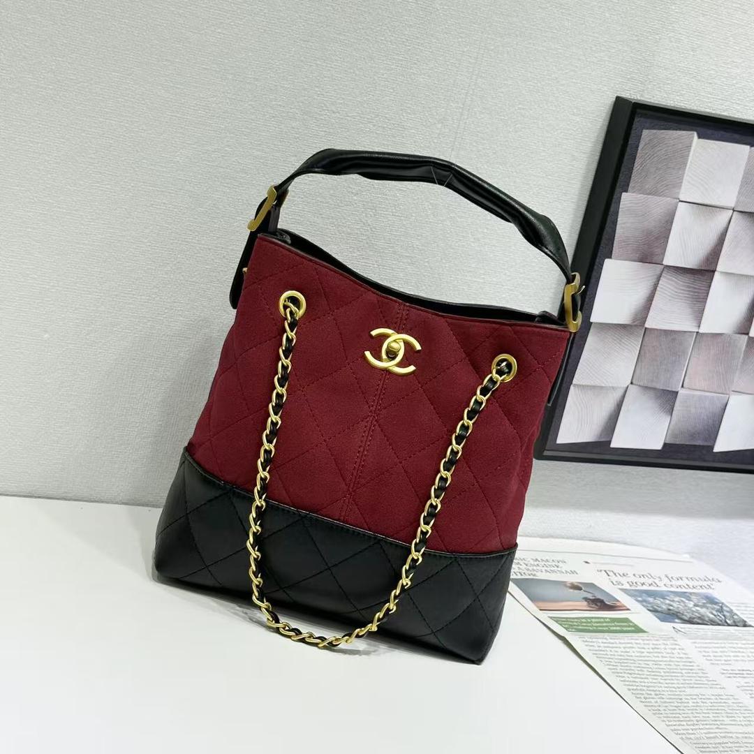 Red and black quilted handbag